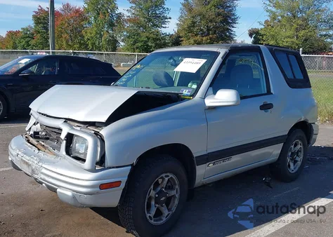 2000 Chevrolet Tracker из США, поврежденный, VIN 2CNBJ18C4Y6911263